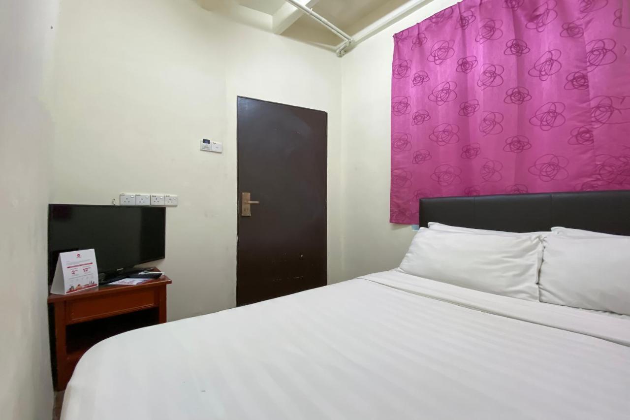 Spot On 89673 Good Friend Hotel George Town Extérieur photo